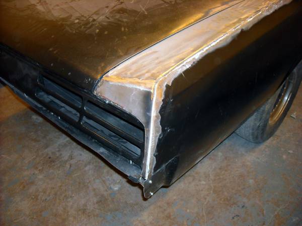 weld_and_grind_right_rear_corner_on_quarter_panel