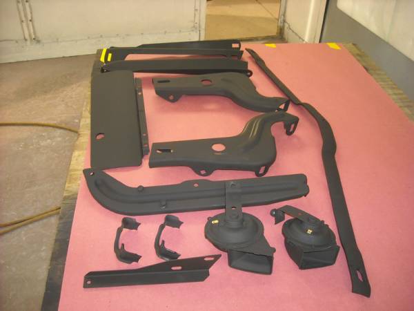 bumper_brackets_and_misc_small_parts_in_epoxy_primer