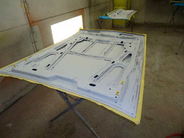 underside_on_AMX_hood_prep_and_masked_for_paint